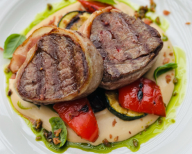 Медальйони з овочами та соусом деміглас