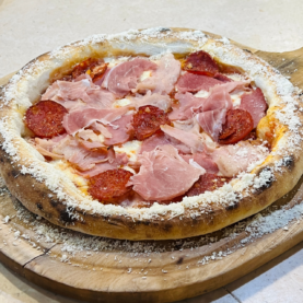 Піца чотири м’яса