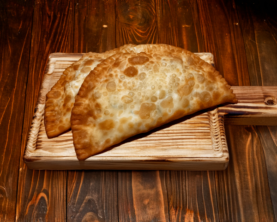 Чебуреки з сиром та зеленню